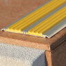 Заказать Профиль алюминиевый с противоскользящей резиновой вставкой (плоская накладка) Евроступень АН 72 желтый 2,5 м Заказать Профиль алюминиевый с противоскользящей резиновой вставкой (плоская накладка) Евроступень АН 72 желтый 2,5 м
