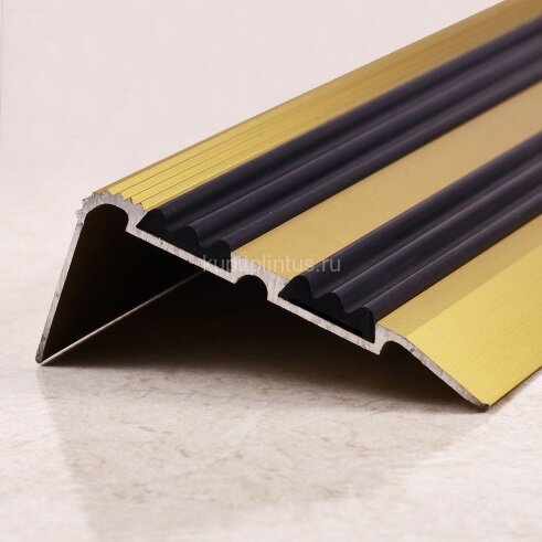 Заказать Угловой порог с двумя резиновыми вставками ПО-68х30 золото матовое 2,7 м Заказать Угловой порог с двумя резиновыми вставками ПО-68х30 золото матовое 2,7 м