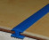 Заказать Противоскользящий Н-образный профиль из резины под плитку 20х10 мм ШОВ синий 30 м 