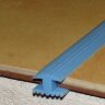 Заказать Противоскользящий Н-образный профиль из резины под плитку 20х10 мм ШОВ голубой 30 м 