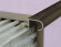 Заказать Алюминиевый профиль для ступеней овальный (ZET OWAL) с рифлением 10 мм PV49-10 коричневый матовый 2,7 м 